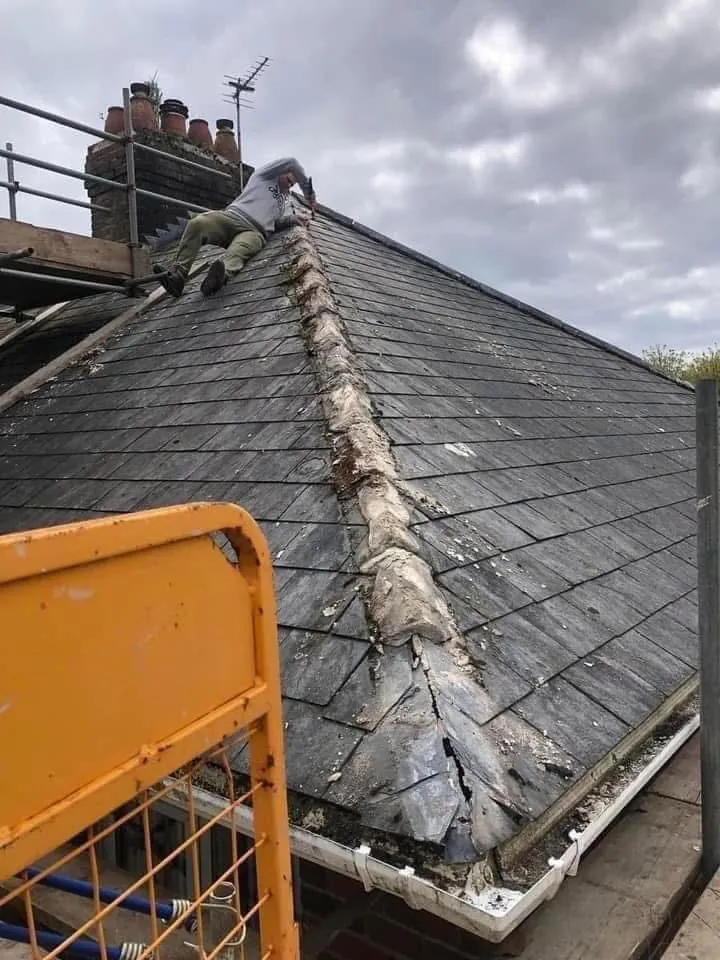 Slate roof ridge and chimney repair in Looe